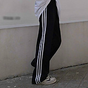 Quần thể thao sọc nữ ống suông rộng dài có túi vải nỉ coton. Quần jogger